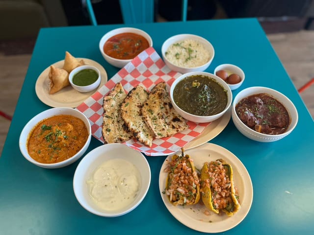 5 Choices Of Any Curries Chicken, fish, lamb, fish, shrimp & Vegetarian! Will Come With 4 Rice!2 PCs Samosa & 2 Garlic Naan.