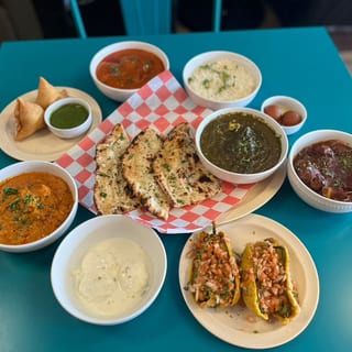 6 Choices Of Any Curries Chicken, fish, lamb, fish, shrimp & Vegetarian! Will Come With 4 Rice!2 PCs Samosa & 2 Garlic Naan